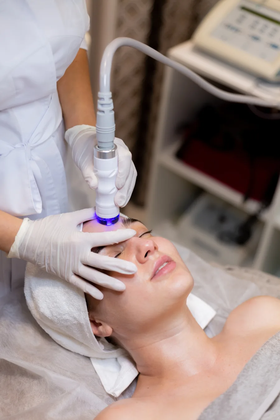LED light panel stimulating skin renewal during treatment