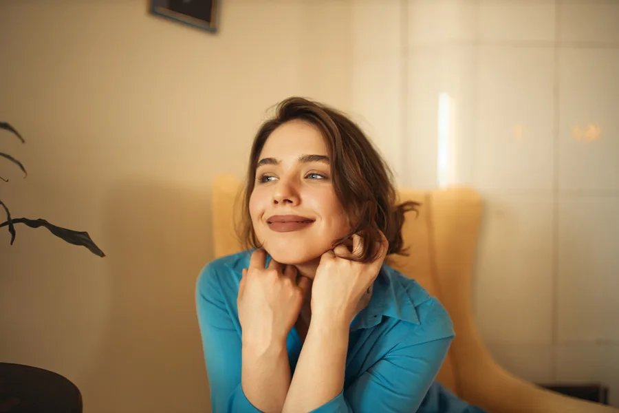 Woman with naturally rejuvenated, lifted facial contours after PDO thread treatment