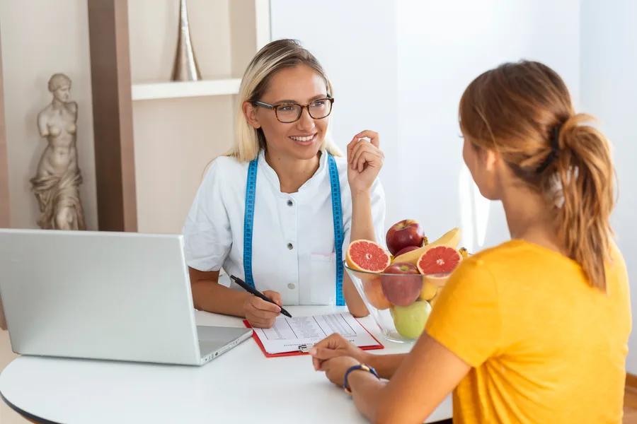 Comprehensive medical evaluation during a weight loss consultation at Kenzi MedSpa